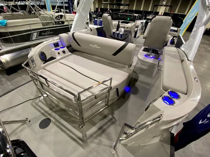 Slide: The Image of 2024 SunChaser Calais 23 SB DC pontoon boat interior with plush seating and modern amenities. - 8
