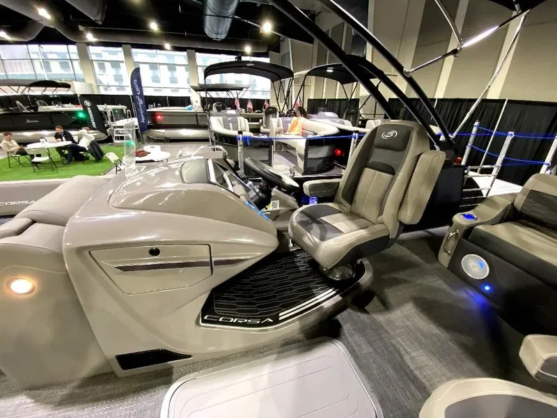 Slide: The Image of 2024 Barletta Corsa Ultra-Lounge 25UCA luxury pontoon boat interior at a boat show. - 12