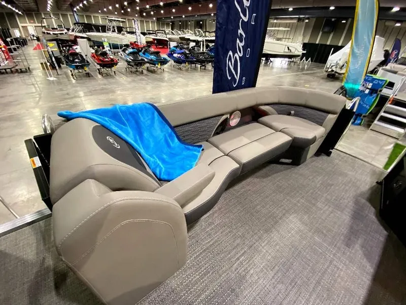 Slide: The Image of 2024 Barletta Corsa Ultra-Lounge 25UCA pontoon boat interior at a boat show. - 14