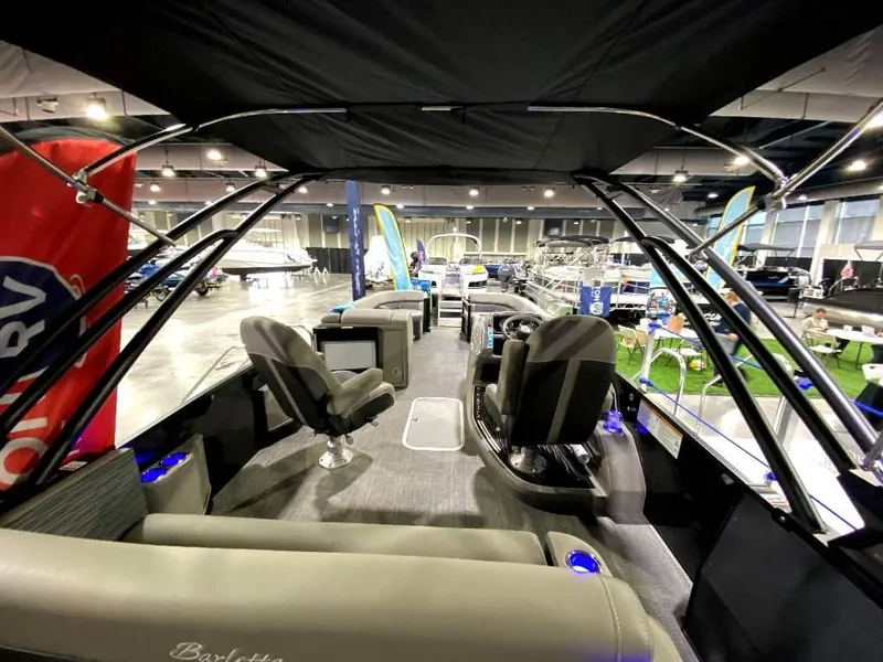 Slide: The Image of 2024 Barletta Corsa Ultra-Lounge 25UCA interior at a boat show. - 7