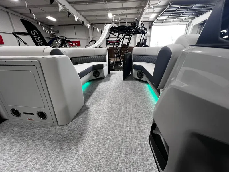 Slide: The Image of 2024 Harris Sunliner 230 interior with modern seating and ambient lighting. - 20