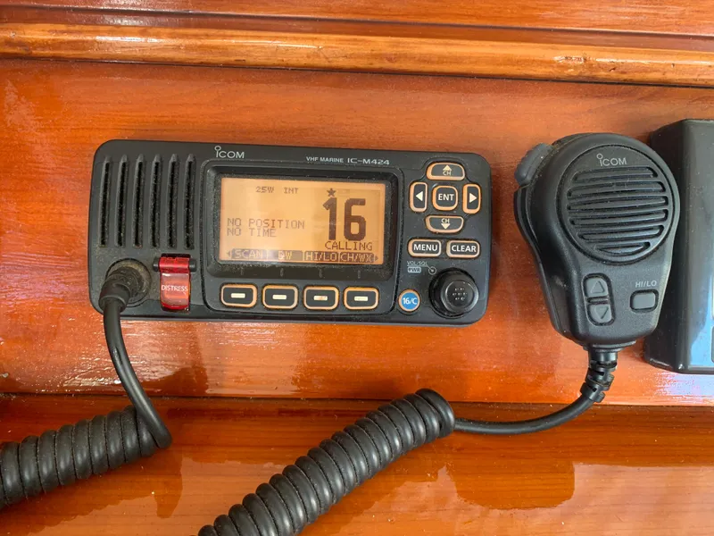 Slide: The Image of Icom marine radio on 1993 Lagoon TPI 42 yacht, channel 16 active. - 22