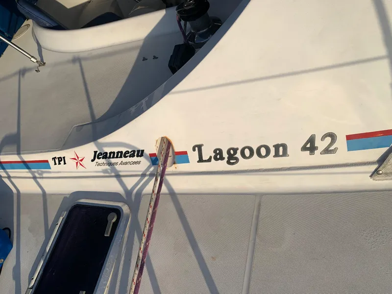 Slide: The Image of Lagoon TPI 42 sailboat deck, 1993 model, featuring Jeanneau branding. - 33
