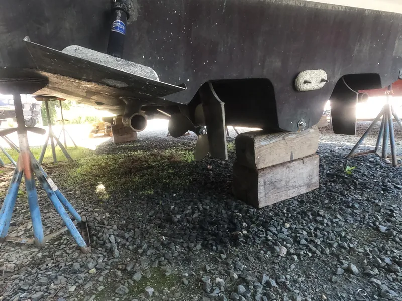 Slide: The Image of 2001 Sea Ray 340 Sundancer on blocks for maintenance. - 16