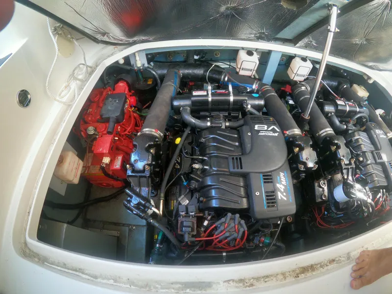 Slide: The Image of 2001 Sea Ray 340 Sundancer engine compartment with twin V8 engines. - 19