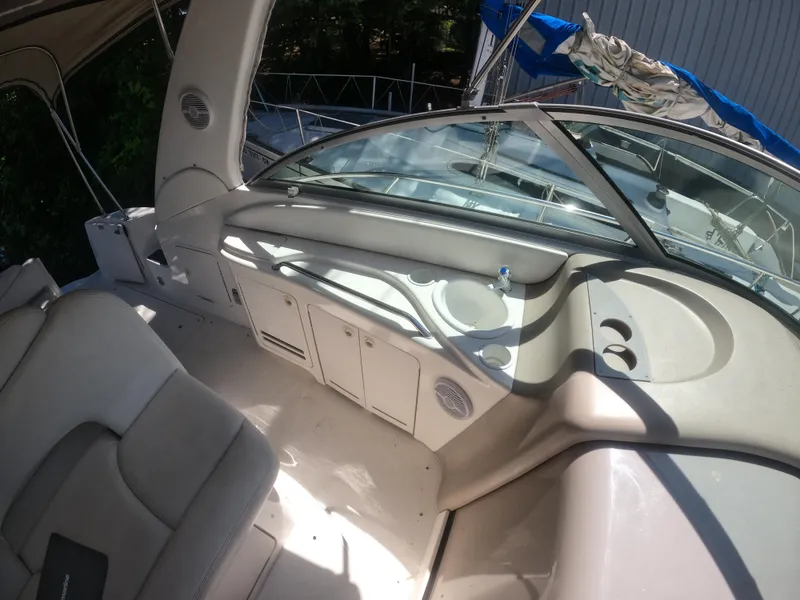 Slide: The Image of 2001 Sea Ray 340 Sundancer boat interior with seating and storage compartments. - 9