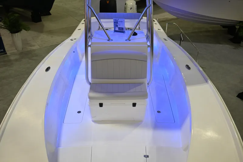 Slide: The Image of 2025 Jersey Cape 31 Little Devil boat interior with blue LED lighting. - 13