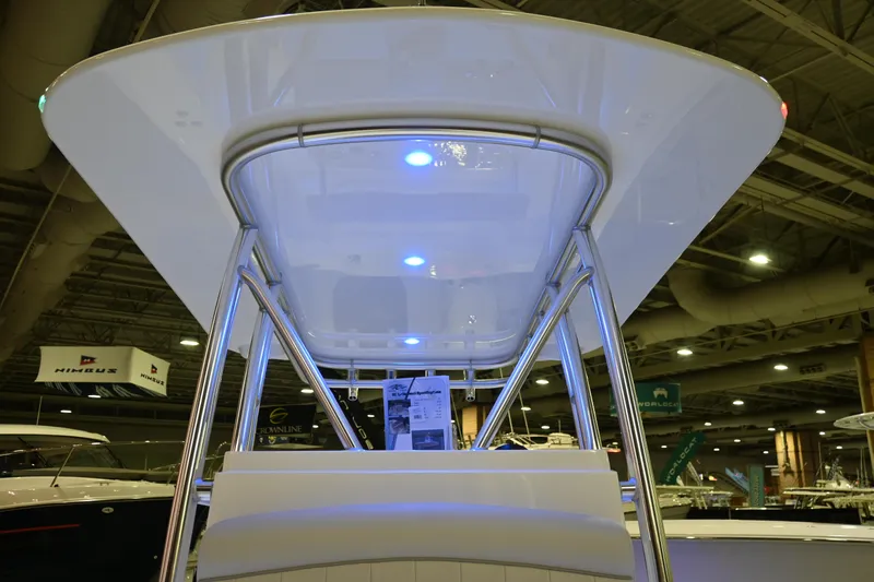 Slide: The Image of 2025 Jersey Cape 31 Little Devil boat at indoor exhibition. - 15