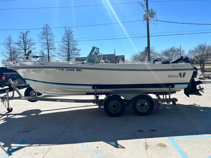 Slide: The Image of 1986 Wellcraft V-20 Sport boat on trailer, side view. - 6