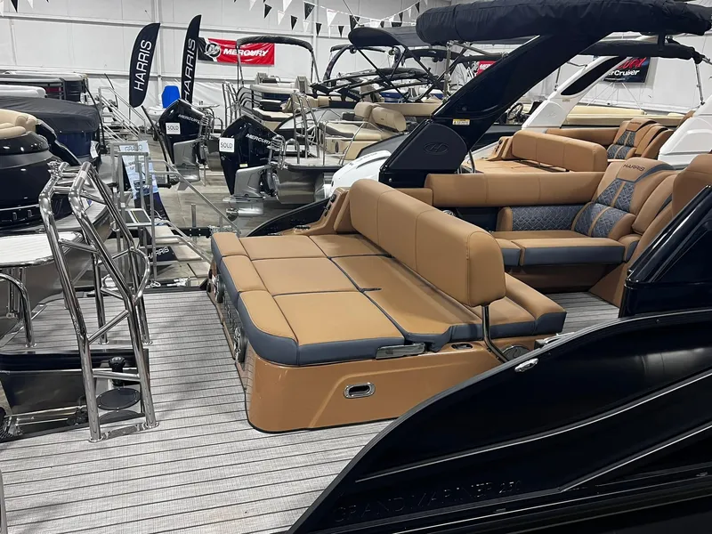 Slide: The Image of 2024 Harris 250 Grand Mariner V10 400 luxury boat interior with seating and deck. - 15