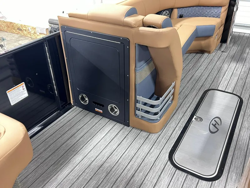 Slide: The Image of 2024 Harris 250 Grand Mariner V10 400 interior with luxurious seating and sleek flooring. - 16