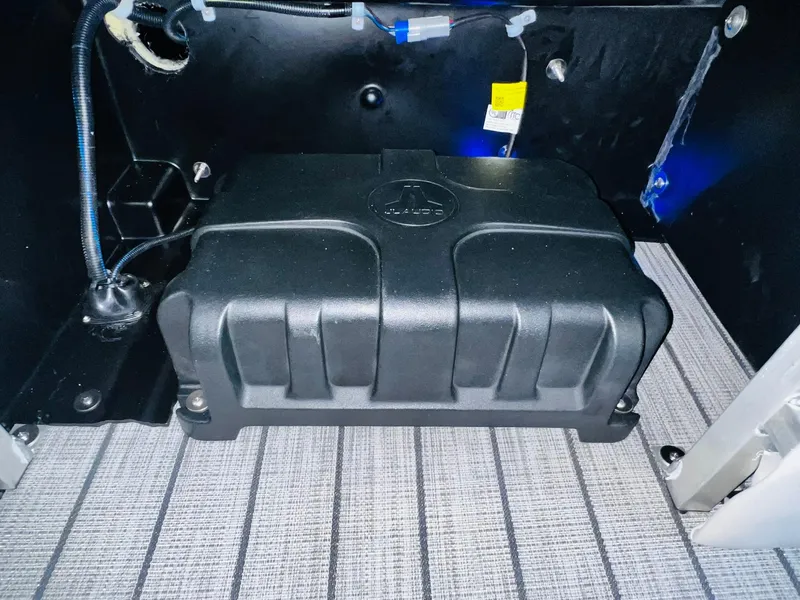 Slide: The Image of Battery compartment of 2024 Harris 250 Grand Mariner V10 400 boat. - 18