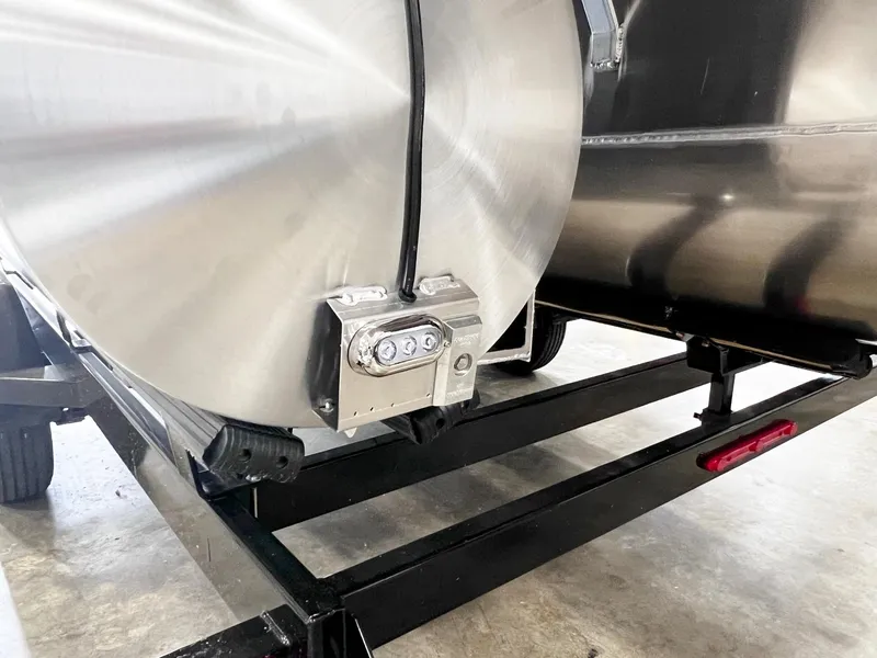 Slide: The Image of Close-up of 2024 Harris 250 Grand Mariner V10 400 pontoon boat on trailer. - 28