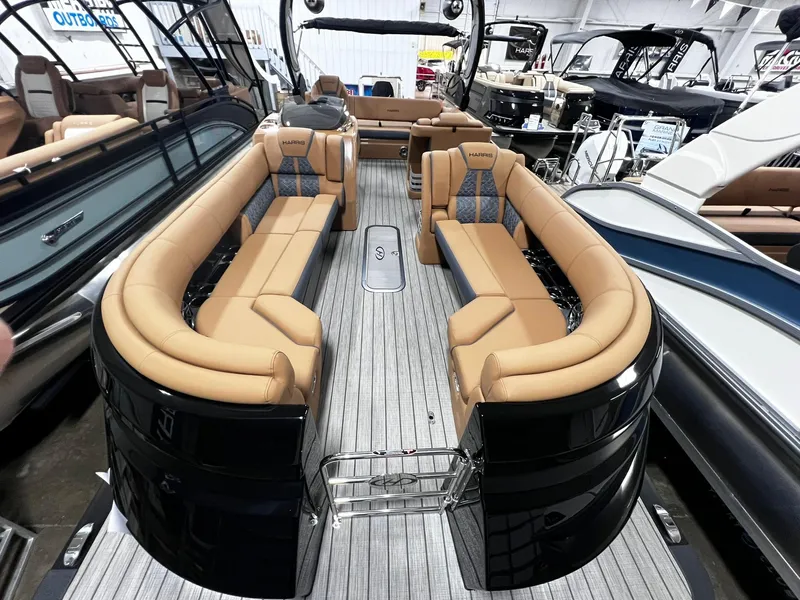 Slide: The Image of 2024 Harris 250 Grand Mariner V10 400 luxury boat interior with plush seating and modern design. - 3