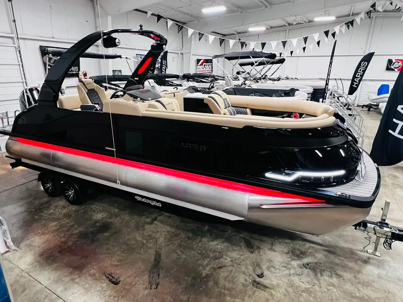 Slide: The Image of 2024 Harris 250 Grand Mariner V10 400 luxury pontoon boat interior with tan seating. - 32