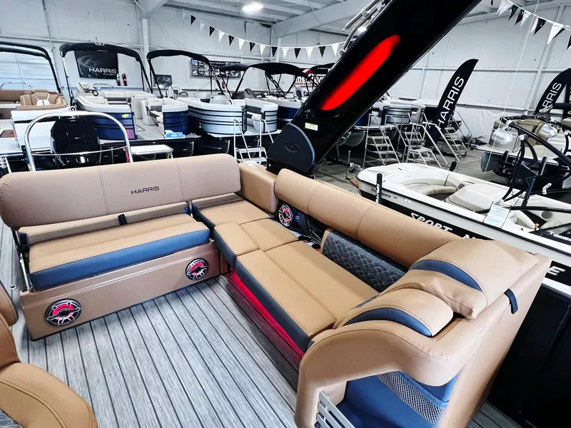Slide: The Image of 2024 Harris 250 Grand Mariner V10 400 pontoon boat interior with luxurious seating. - 7