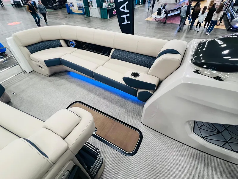 Slide: The Image of 2024 Harris 250 Grand Mariner V10 400 interior with luxurious seating and ambient lighting. - 18