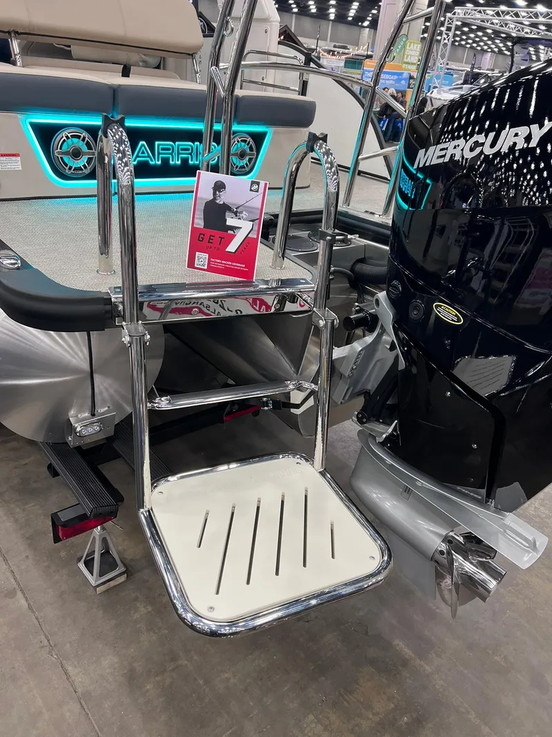 Slide: The Image of 2024 Harris 250 Grand Mariner V10 400 boat with Mercury engine and swim ladder. - 20