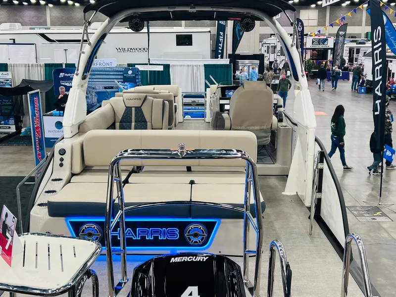 Slide: The Image of 2024 Harris 250 Grand Mariner with Mercury 400 V10 engine, rear view. - 24