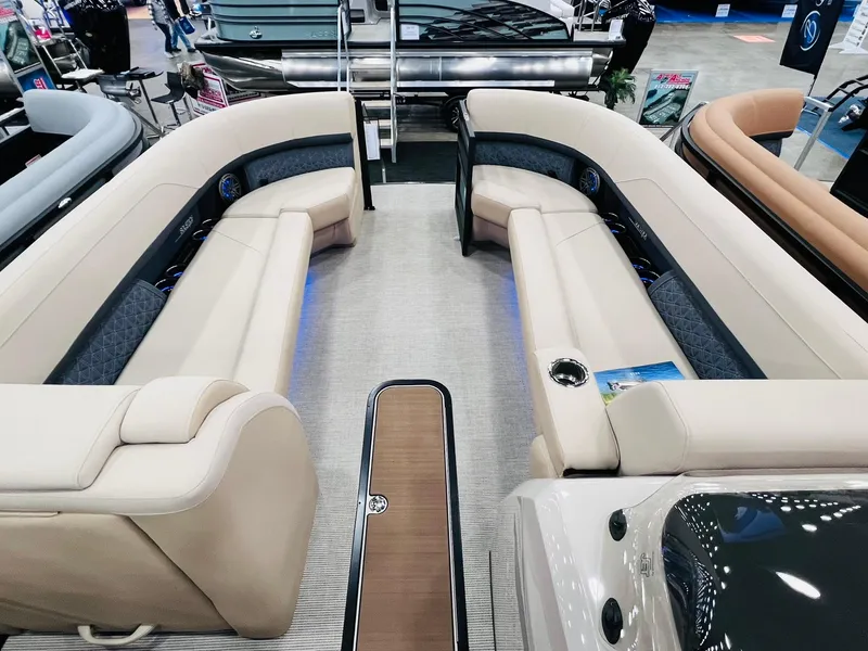 Slide: The Image of 2024 Harris 250 Grand Mariner V10 400 interior with beige seating and modern design. - 5