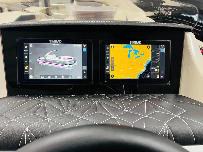 Slide: The Image of Dual Simrad displays on 2024 Harris FloteBote 250 Grand Mariner V10 400 dashboard. - 9