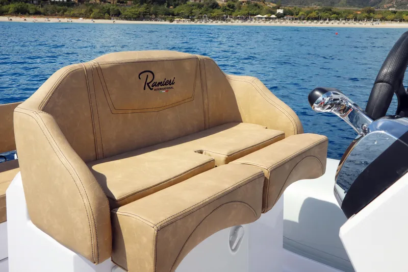 Slide: The Image of Ranieri Cayman 23.0 Sport Touring 2025 boat seat with ocean view. - 3