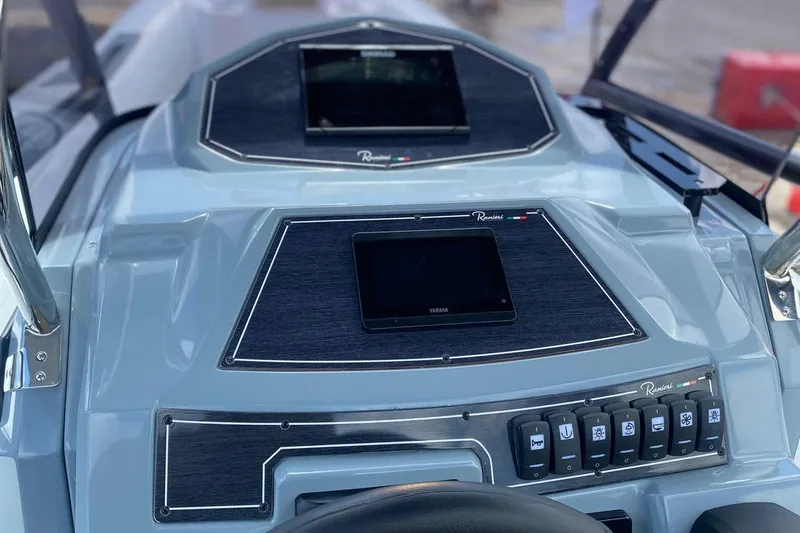 Slide: The Image of 2025 Ranieri Cayman 23.0 Sport Touring dashboard with modern controls and displays. - 8