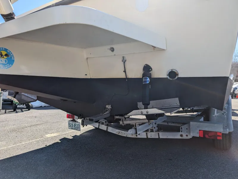 Slide: The Image of 1999 Parker 2510 Walkaround boat on trailer, rear view. - 14