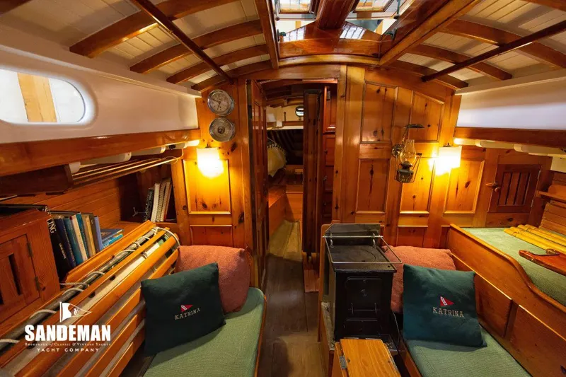 Slide: The Image of Interior of a 1963 Concordia 41 Yawl with wooden furnishings. - 3