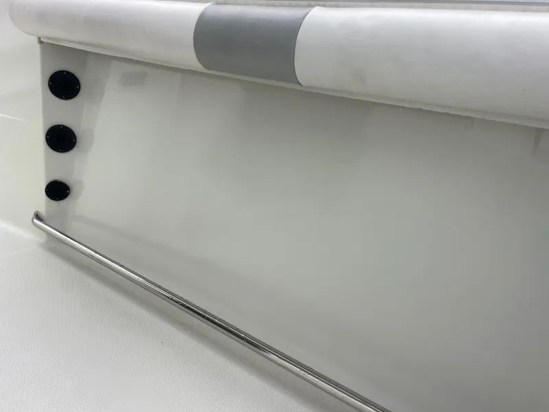 Slide: The Image of Close-up of the interior side panel of a 2006 Sailfish 2360 CC boat. - 22