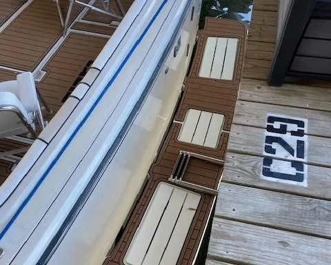 Slide: The Image of 1989 Tiara Yachts 3300 Open docked at slip C29. - 6