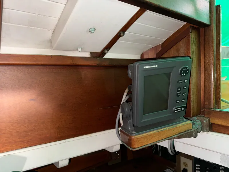 Slide: The Image of Furuno navigation system on 1960 Concordia 39 Yawl, wooden interior detail. - 15