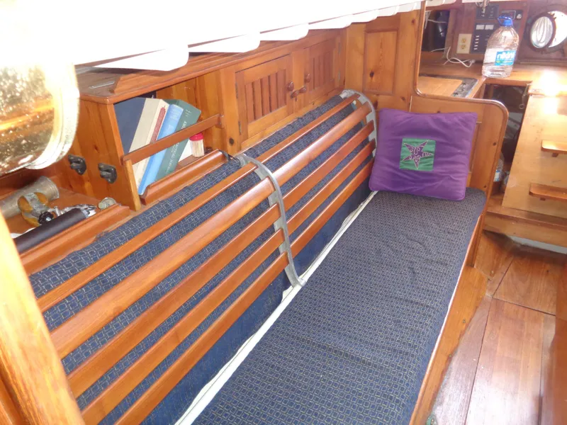 Slide: The Image of Interior of 1960 Concordia 39 Yawl with wooden seating and nautical decor. - 5