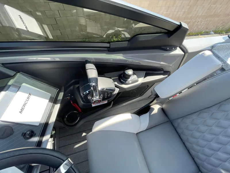 Slide: The Image of Interior cockpit of 2024 Avalon 2585 EXCALIBUR LTD VRB boat with modern controls. - 11