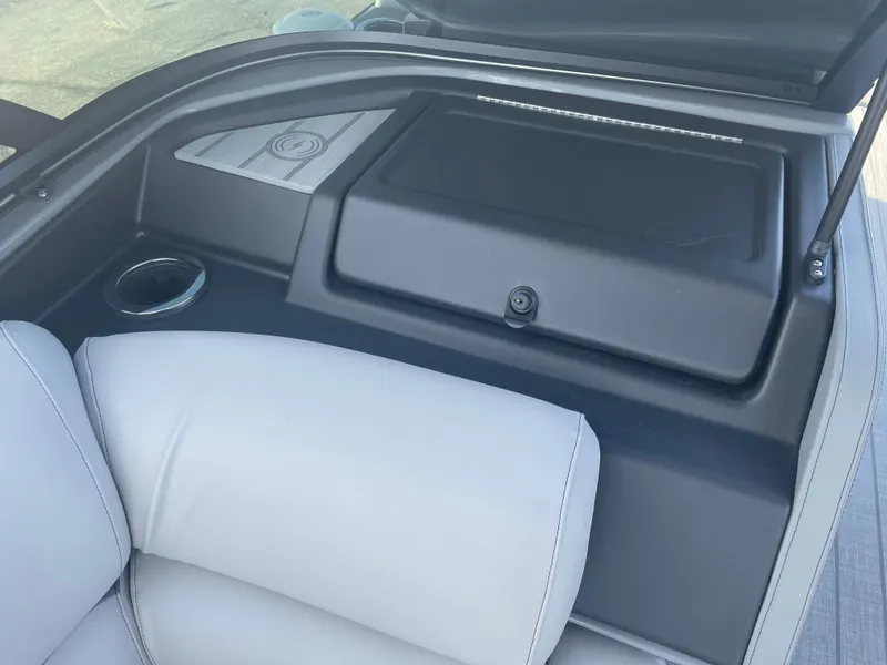 Slide: The Image of 2024 Avalon 2585 EXCALIBUR LTD VRB boat interior with seating and storage compartment. - 16