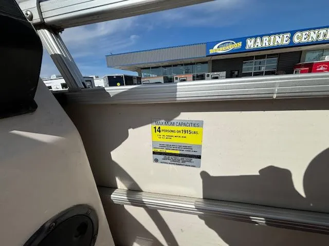 Slide: The Image of Capacity label on 2002 Godfrey Aqua Patio boat, 14 persons or 1915 lbs. - 19