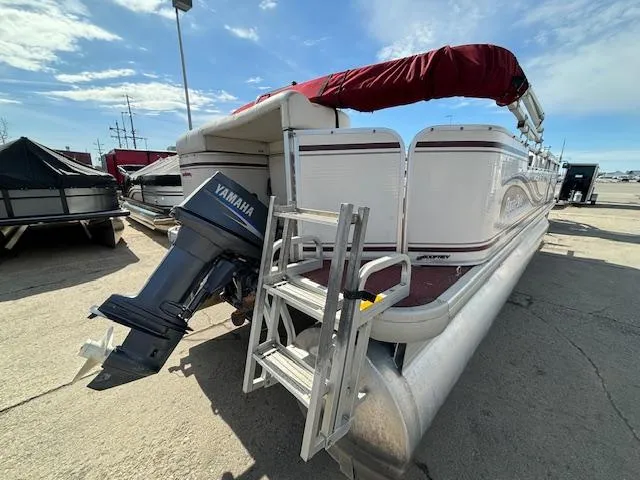 Slide: The Image of 2002 Godfrey Aqua Patio pontoon boat with Yamaha outboard motor. - 23