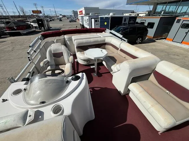 Slide: The Image of 2002 Godfrey Aqua Patio pontoon boat with spacious seating and table. - 8