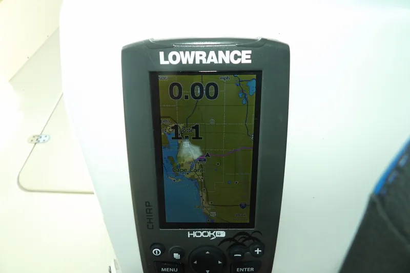 Slide: The Image of Lowrance fishfinder on 2018 NauticStar 203DC Sport Deck boat. - 25