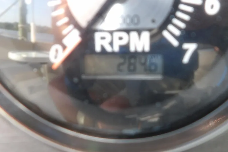 Slide: The Image of Close-up of RPM gauge on 2018 NauticStar 203DC Sport Deck boat. - 28