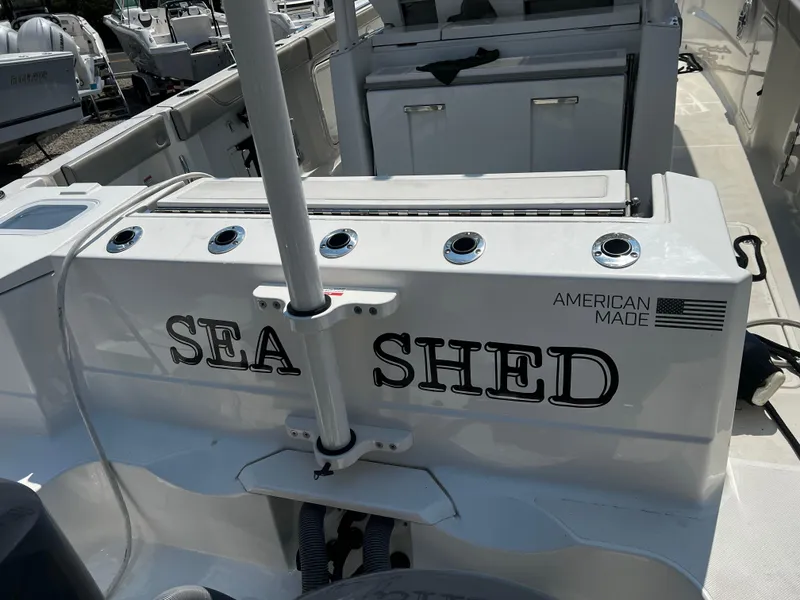 Slide: The Image of 2022 Pursuit S 328 Sport boat with Sea Shed and American Made labels. - 21