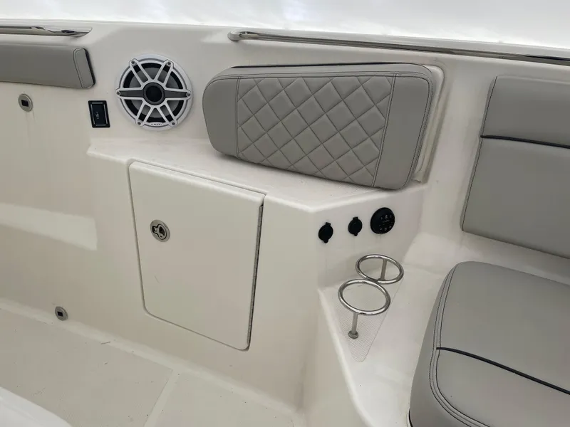Slide: The Image of Interior seating and speaker system of 2022 Pursuit S 328 Sport boat. - 49