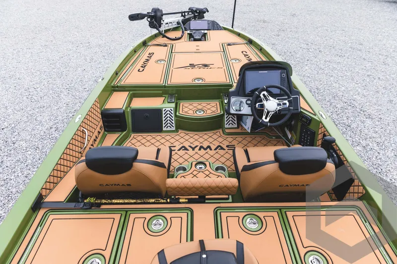 Slide: The Image of 2024 Caymas XS 20 Pro boat interior with advanced navigation system and comfortable seating. - 14