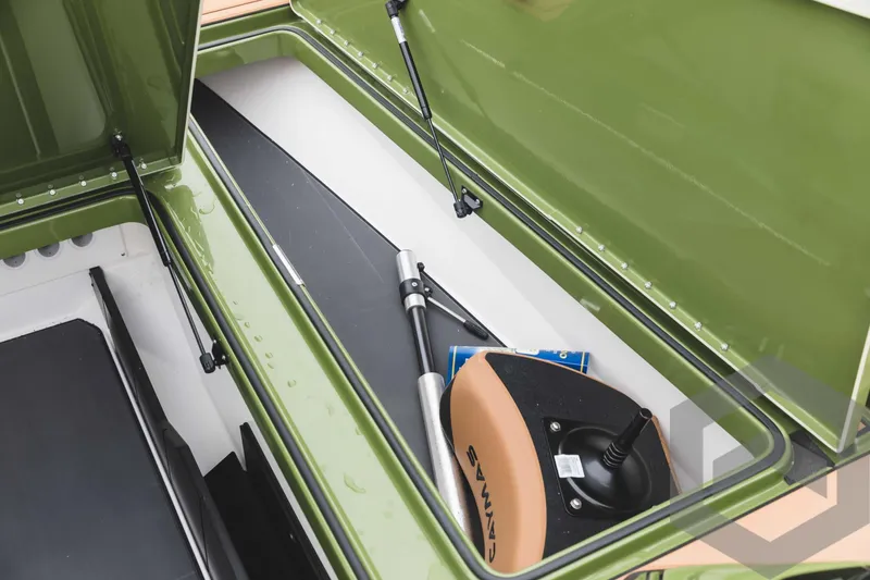 Slide: The Image of 2024 Caymas XS 20 Pro storage compartment with equipment. - 18