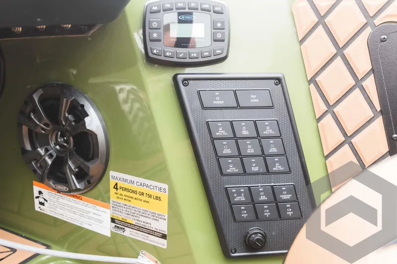 Slide: The Image of Control panel and speaker system of 2024 Caymas XS 20 Pro boat. - 28