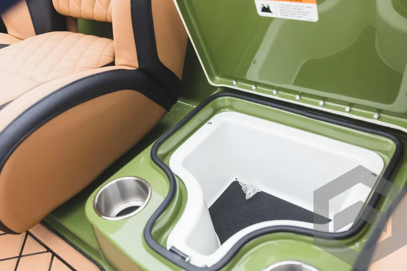 Slide: The Image of 2024 Caymas XS 20 Pro boat interior storage compartment and seating. - 33
