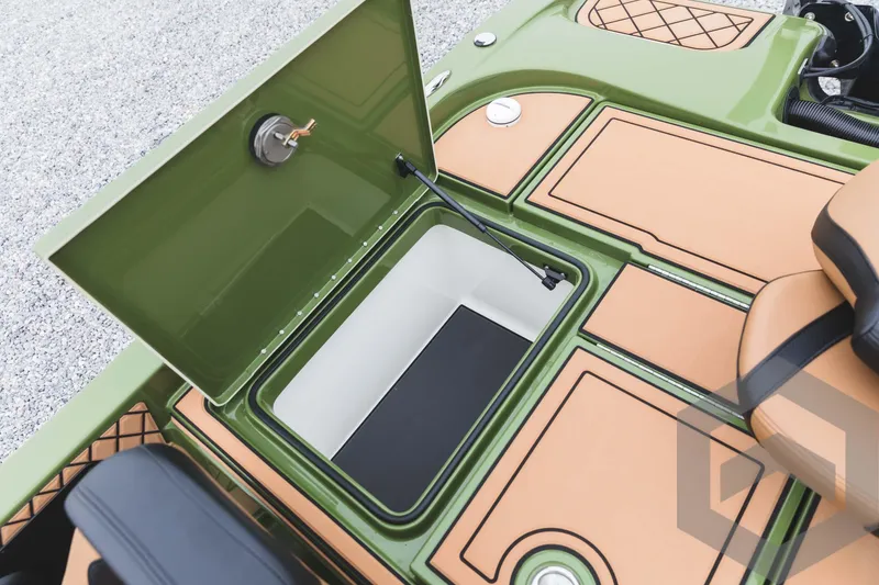 Slide: The Image of 2024 Caymas XS 20 Pro boat storage compartment with open lid. - 36