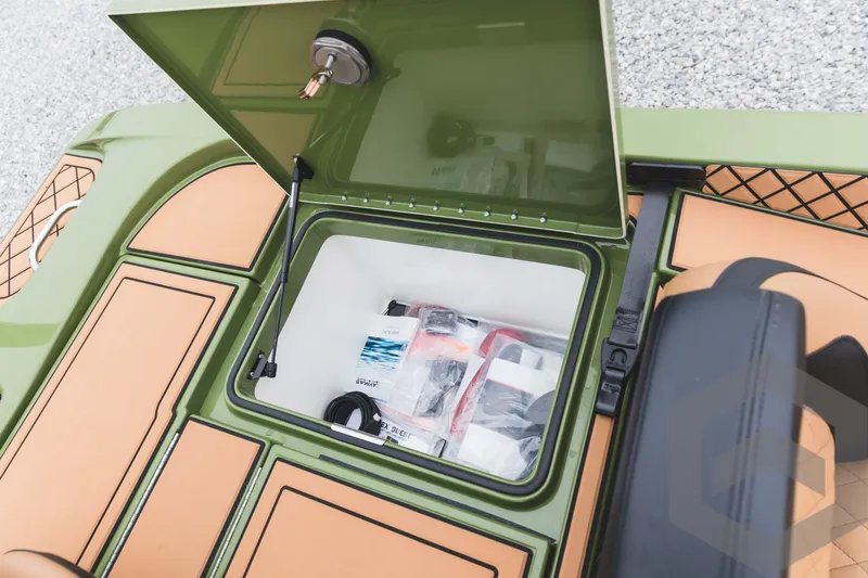 Slide: The Image of 2024 Caymas XS 20 Pro storage compartment with various items inside. - 39