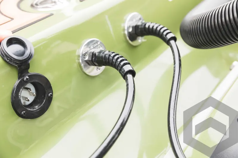 Slide: The Image of Close-up of 2024 Caymas XS 20 Pro boat electrical connections and cables. - 42