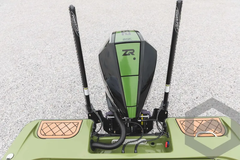 Slide: The Image of 2024 Caymas XS 20 Pro boat engine and rear deck view. - 44